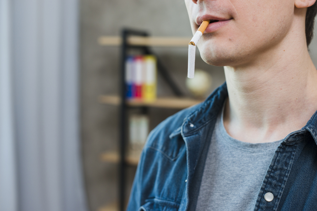 portrait-young-man-carrying-broken-cigarette-mouth (1).jpg