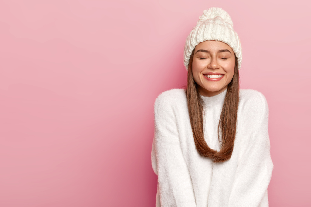 horizontal-shot-pretty-young-female-with-dark-hair-keeps-eyes-shut-smiles-pleasantly-shows-white-perfect-teeth-enjoys-comfort-new-bought-sweater-warm-hat.jpg horizontal-shot-pretty-young-female-with-dark-hair-keeps-eyes-shut-smiles-pleasantly-shows-white-perfect-teeth-enjoys-comfort-new-bought-sweater-warm-hat.jpg